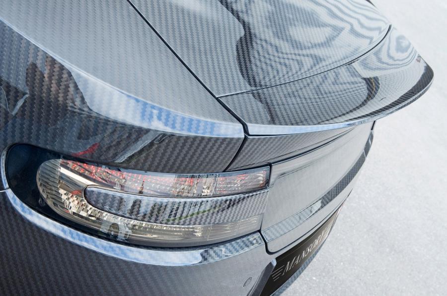 Детали экстерьера Aston Martin DB9 Cyrus by Mansory 2009 года  (фото 19 из 34)